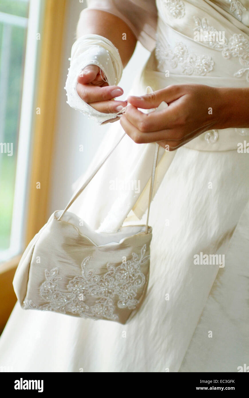 Bride with Handbag Stock Photo Alamy