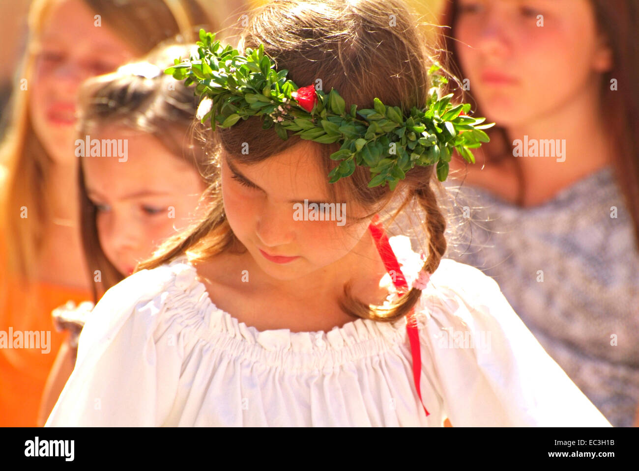 Girl with Floral Wreath in her Hair Stock Photo - Alamy