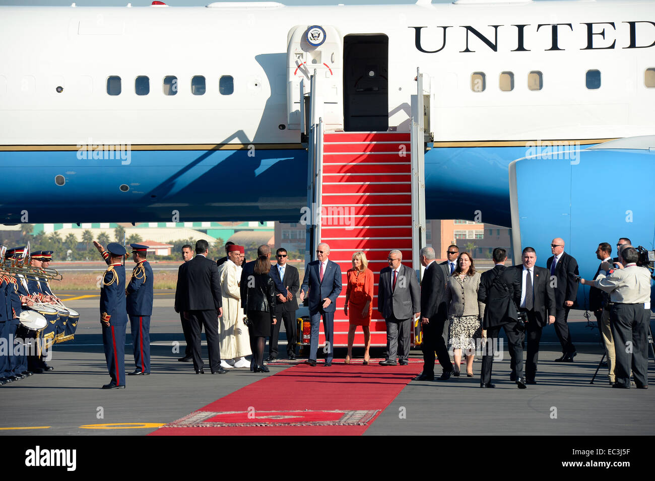 U.S. Vice President Joe Biden and Dr. Jill Biden are greeted by Moroccan officials upon their arrival to Marrakech, Morocco, to attend the fifth Global Entrepreneurship Summit on November 19, 2014. Stock Photo