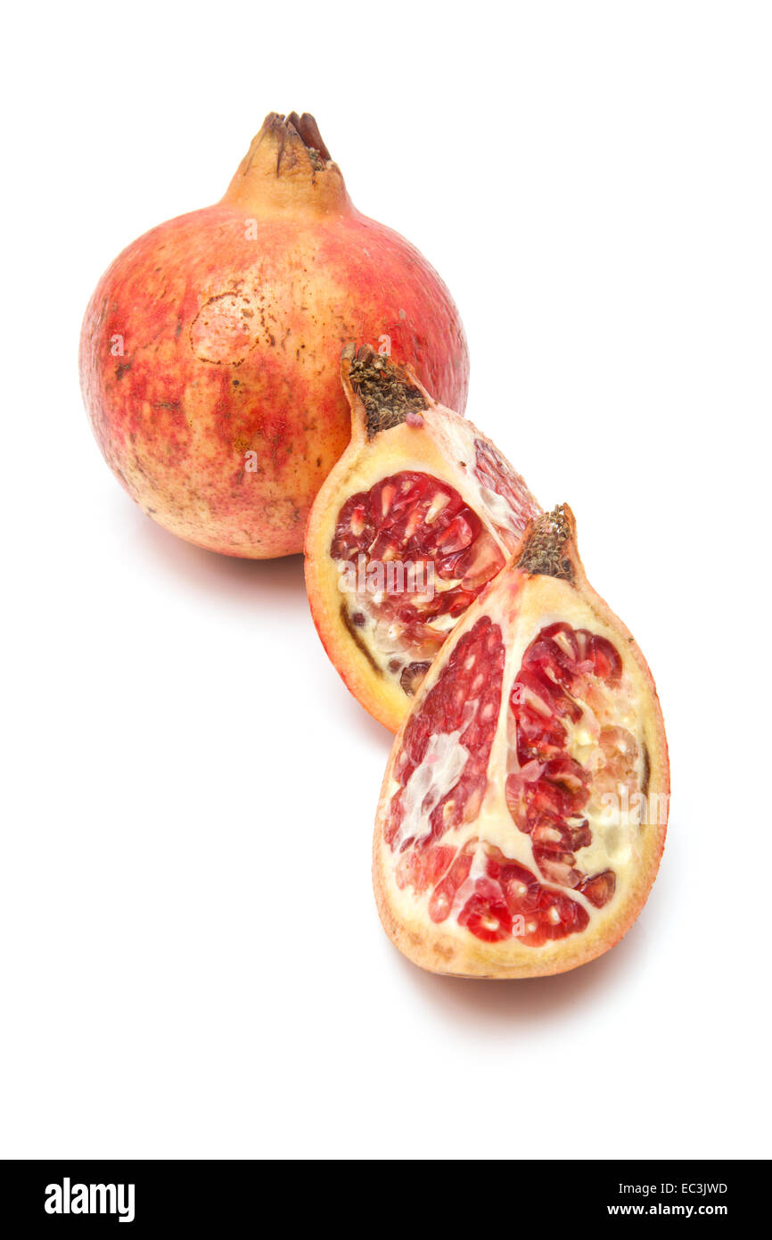 Pomegranate fruit, Punica granatum isolated on a white studio background. Stock Photo
