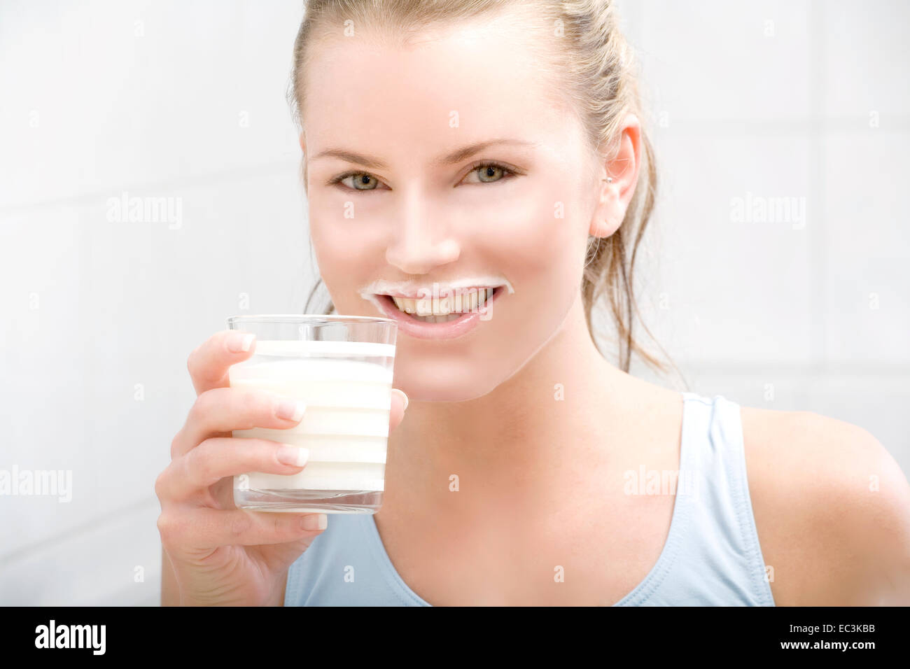 Young Woman drinking Milk and having a Milksop Stock Photo Alamy