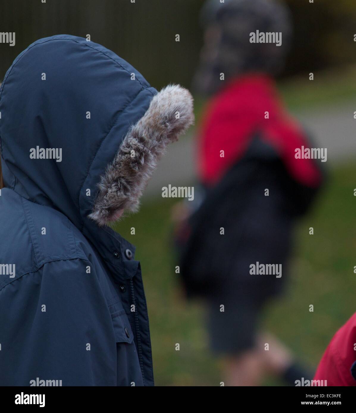 Kids with their coat hoods up Stock Photo Alamy