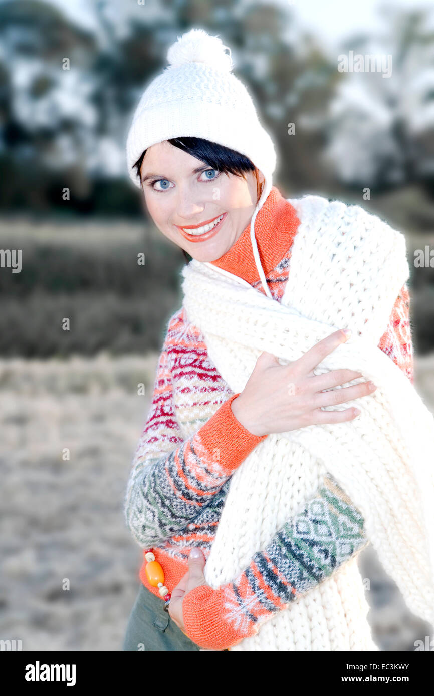 Young Woman in Winterly Clothing Stock Photo