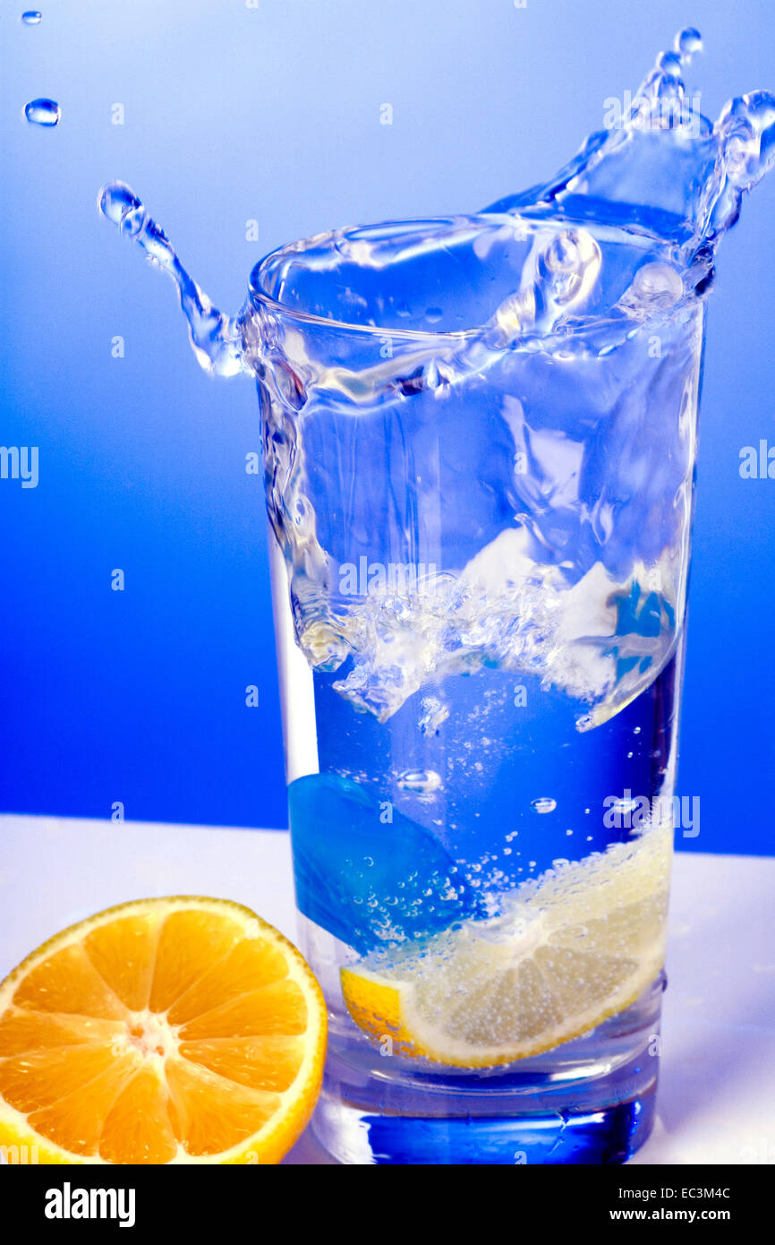 Sloshing Glass of Water with Lemon Stock Photo Alamy