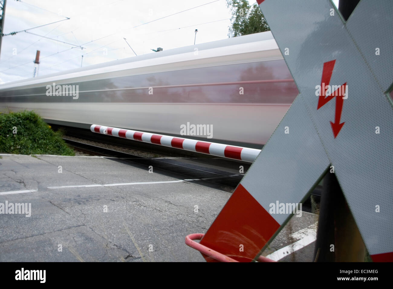 Train at Railway Crossing Stock Photo - Alamy