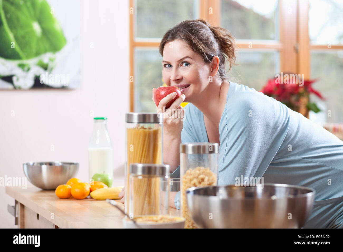 Pregnant Woman eating Apple Stock Photo Alamy