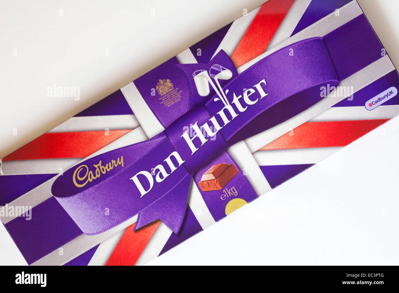 Bar of 1kg Cadbury personalised chocolate bar for Dan Hunter to commemorate the Olympics on white background Stock Photo