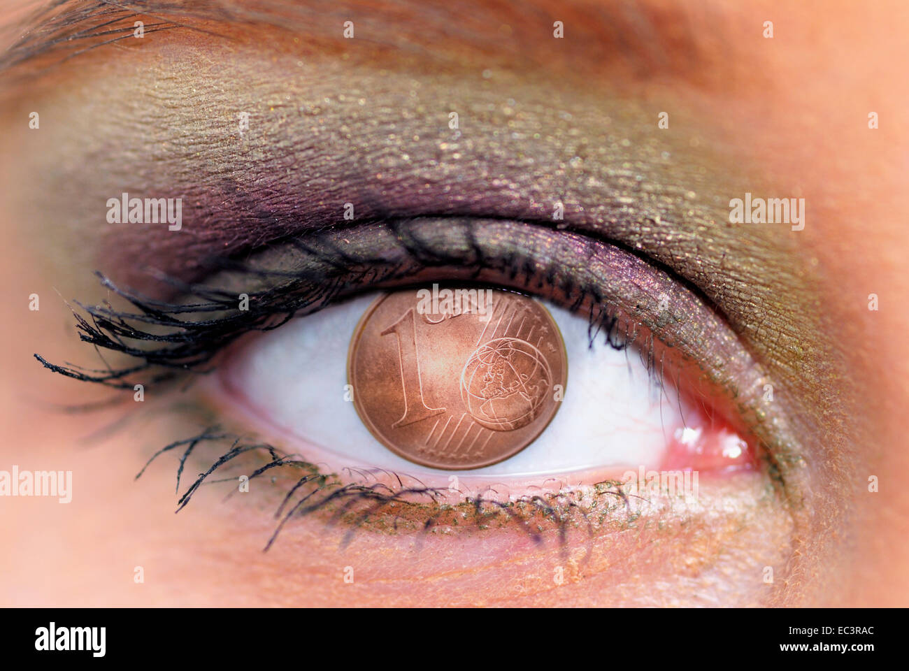 Brown Eye of a Woman, Cent Coin Stock Photo