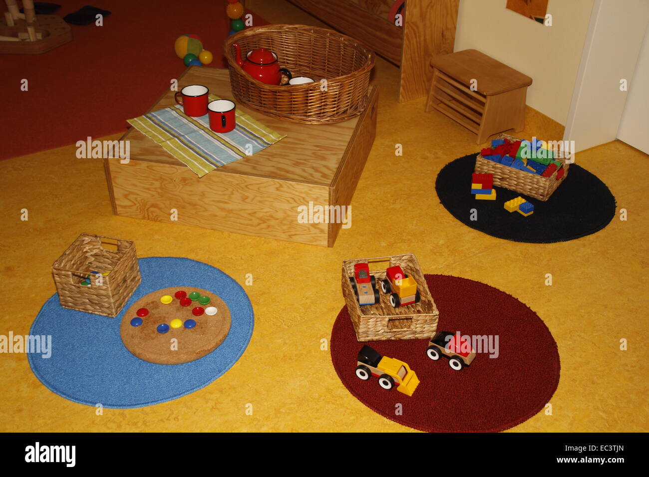 Plastic toys in a childrens room ready to play with Stock Photo