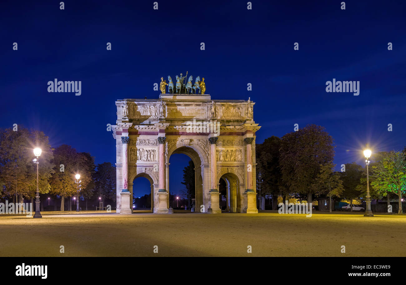 Night view of Paris Arc de Triomphe du Carrousel, built in memory of Napoleon victories Stock Photo