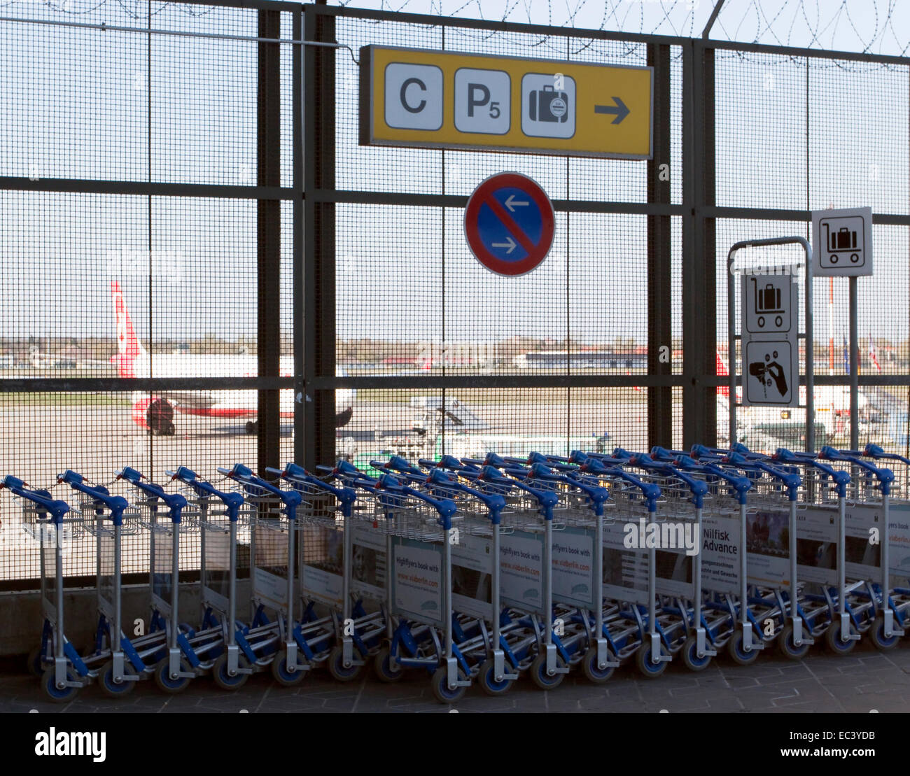 Luggage trolley at the airport Stock Photo