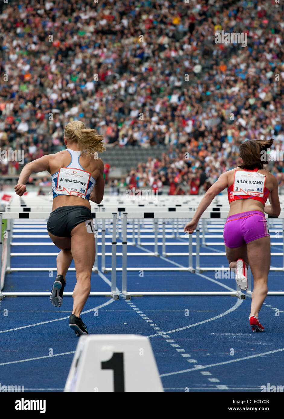 The Germans Nadine Hildebrand and Lilly Schwarzkopf immediately after the start of the 100 meter hurdles at the ISTAF 2012 at Stock Photo