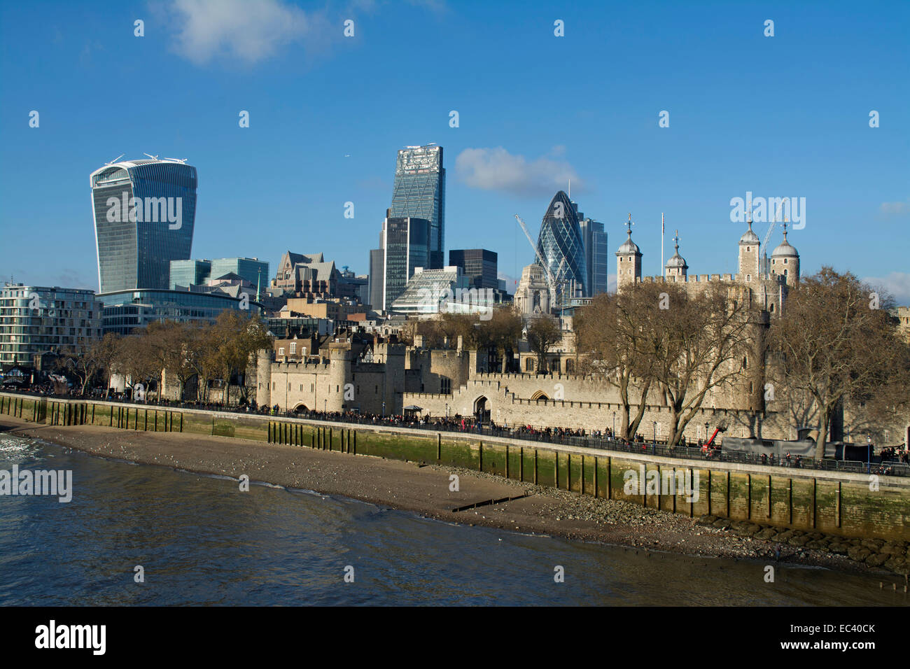 North bank of the River Thames, The Tower of London and The Gherkin viewed from Tower Bridge Stock Photo