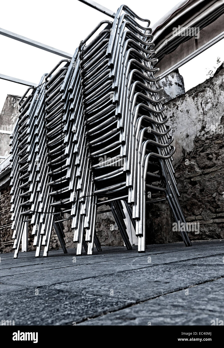 stacked chrome chairs Stock Photo Alamy