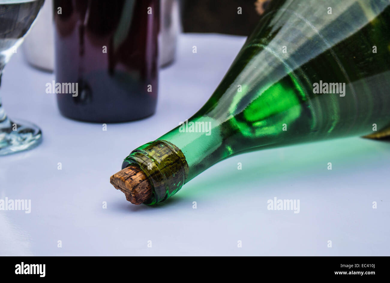 Laying bottle of wine on the table Stock Photo Alamy