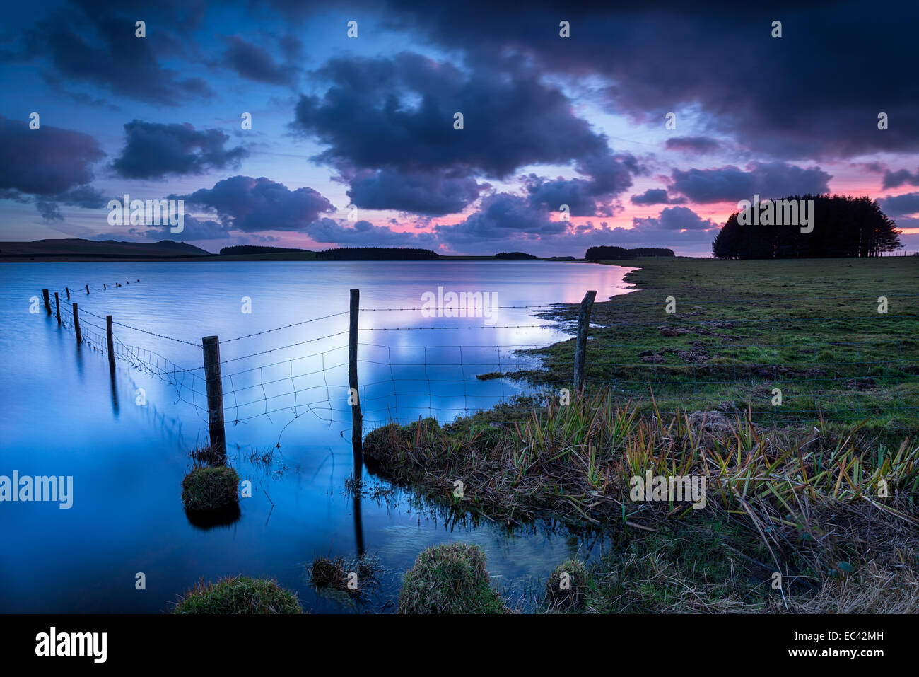 Sunset over the Crowdy Reservoir near Davidstow on Bodmin Moor in Cornwall Stock Photo