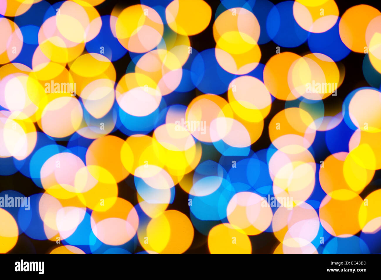 Beautiful colorful defocused bokeh festive lights as abstract holiday celebration background Stock Photo