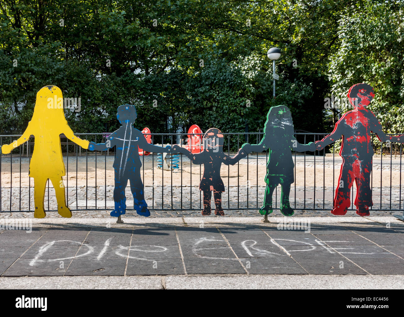 Figures at a children s playground Stock Photo Alamy