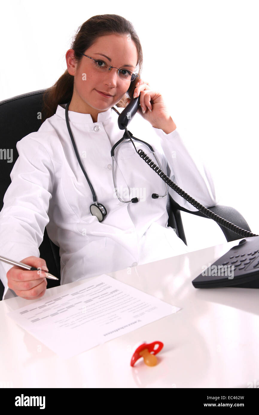 Doctor giving Expert Opinion and phoning Stock Photo