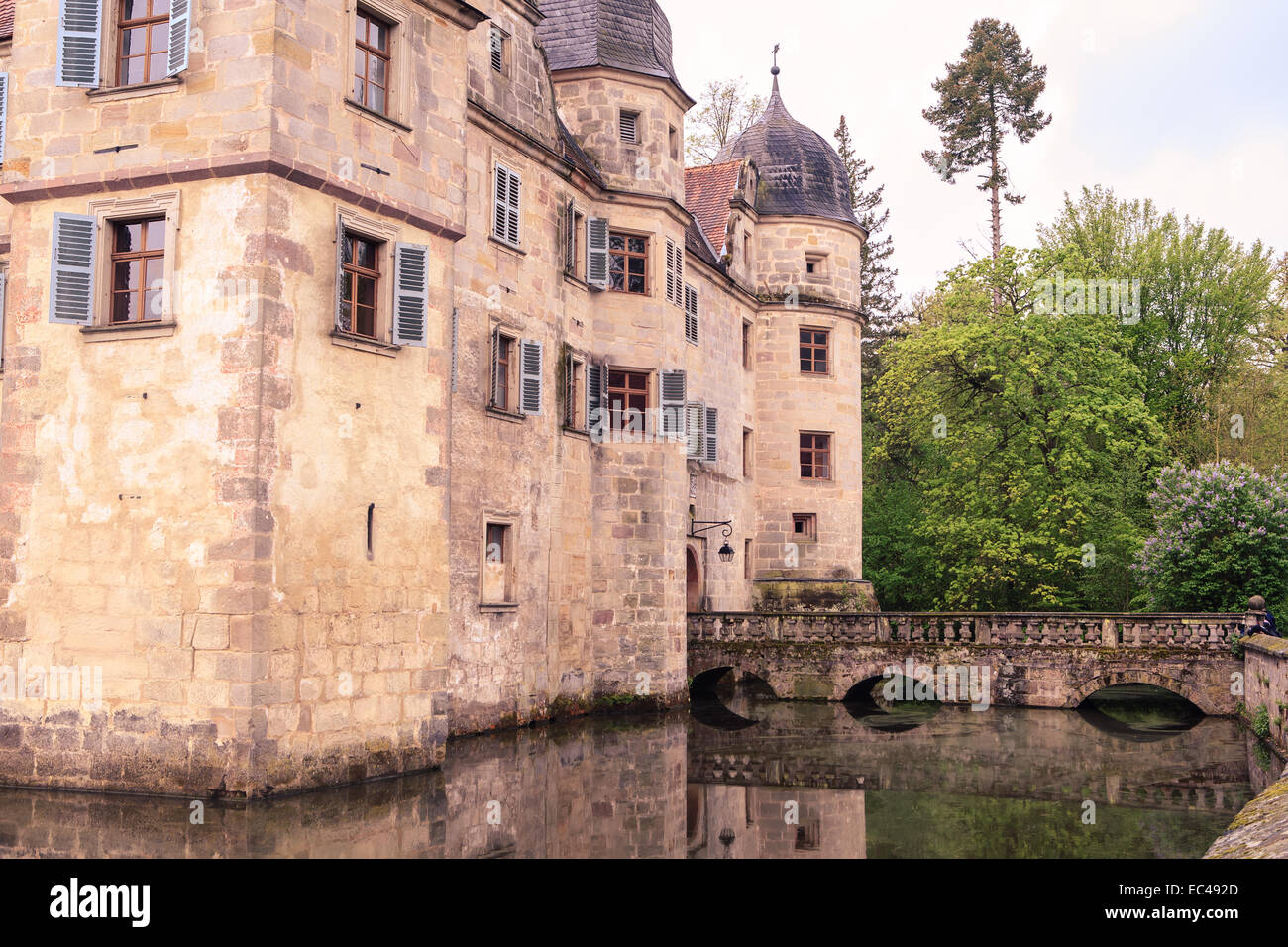 Castle Wasserschloss with pond around the wall in Mitzwitz, Germany Stock Photo