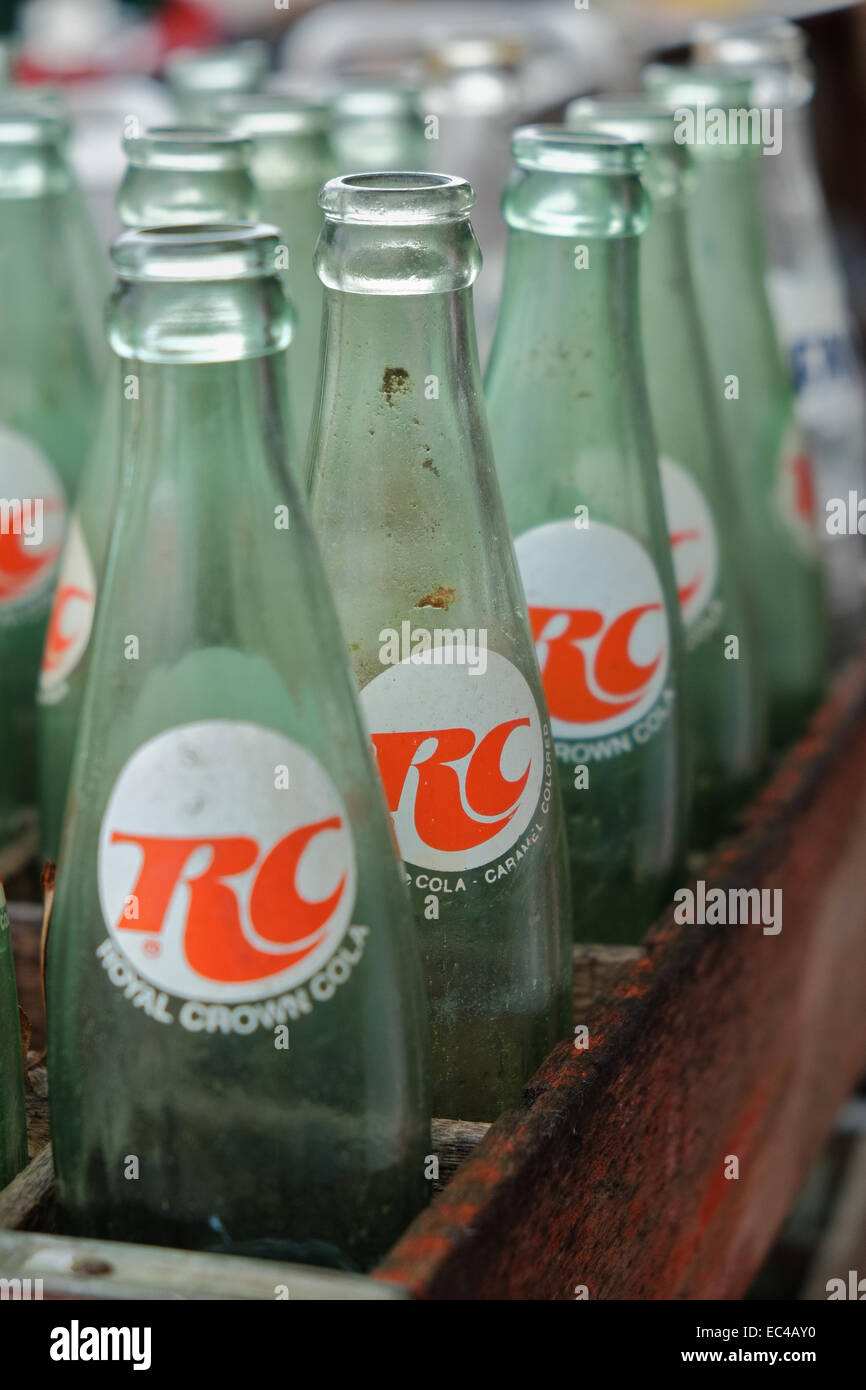 Old empty RC Cola bottles in a wooden crate found in a rural Alabama, USA, antique store. Stock Photo