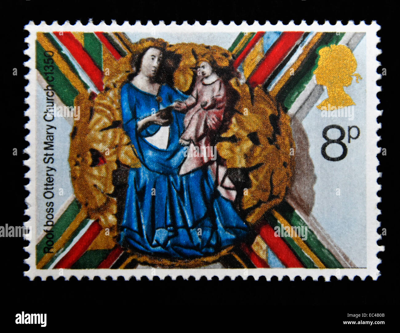 Postage stamp. Great Britain. Queen Elizabeth II. 1974. Christmas. Church roof bosses. Virgin and Child, Ottery St.Mary Church. Stock Photo