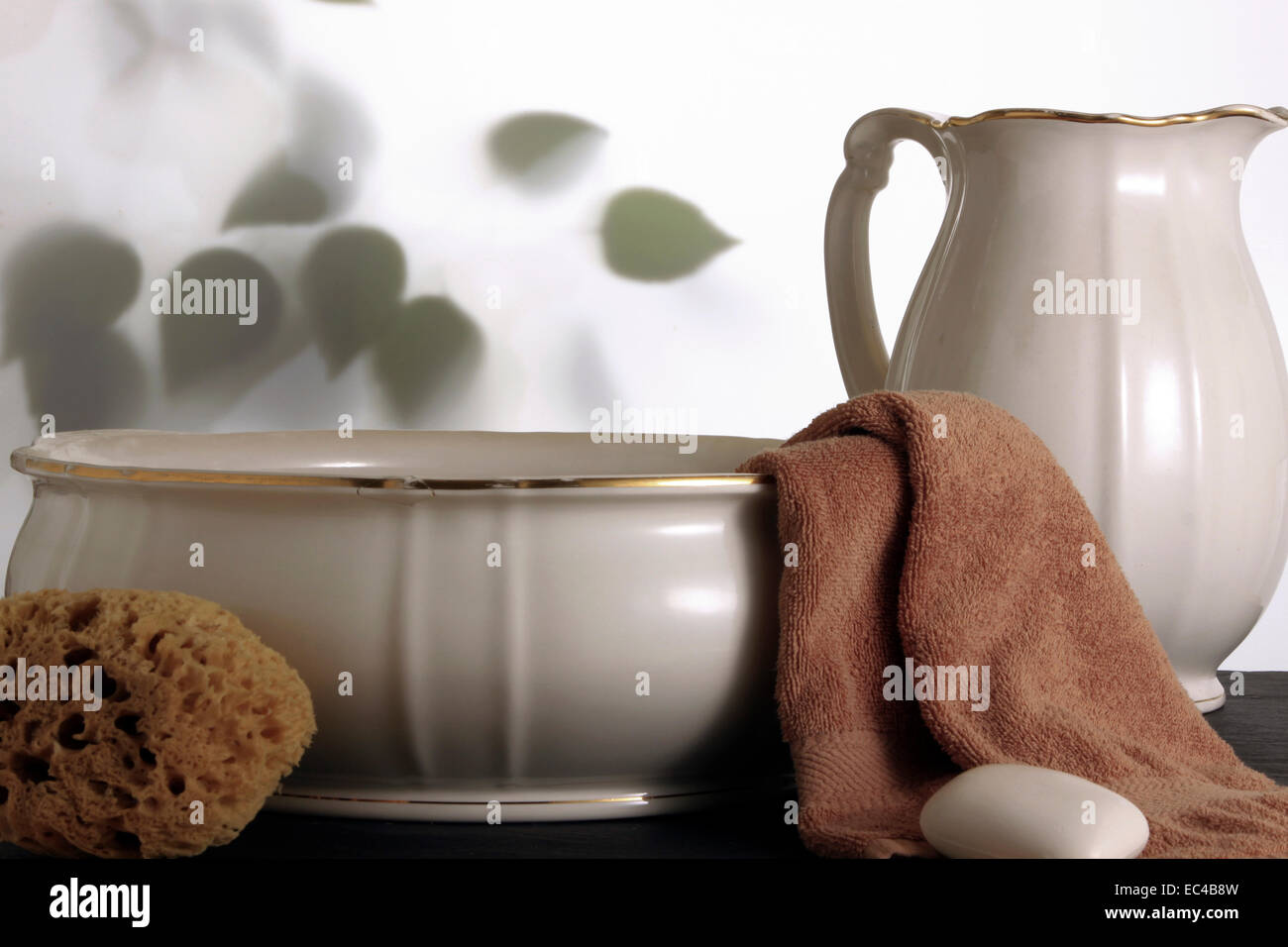 Old wash basin with towel, soap and sponge Stock Photo Alamy