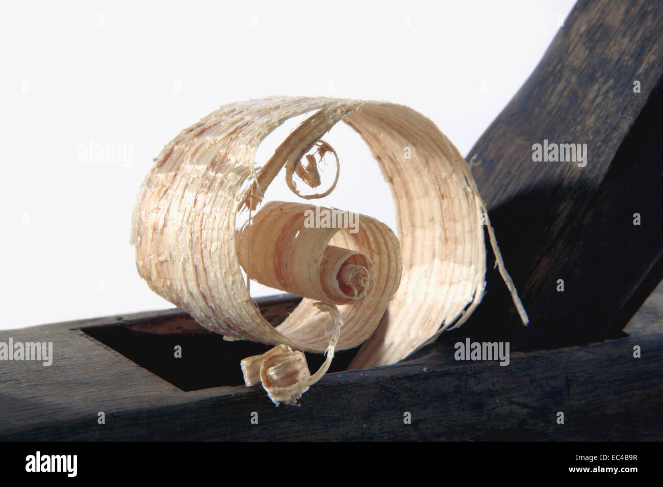antique plane with wood shavings Stock Photo