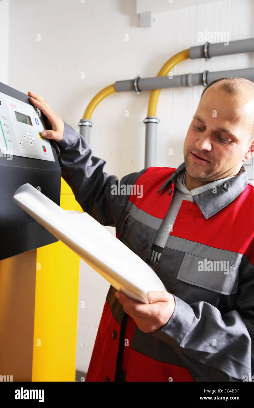 Heating engineers, maintenance, inspection Stock Photo Alamy