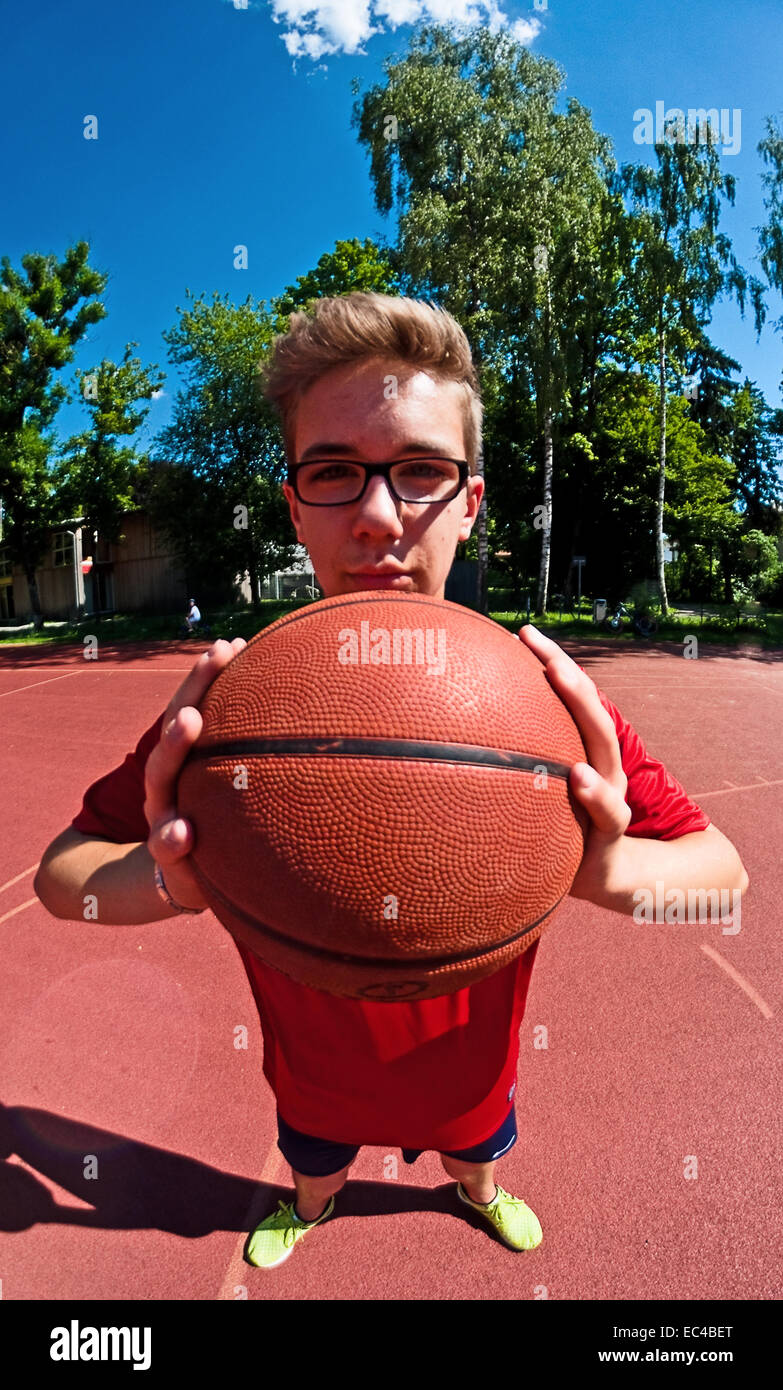 A guy with a basketball Stock Photo Alamy