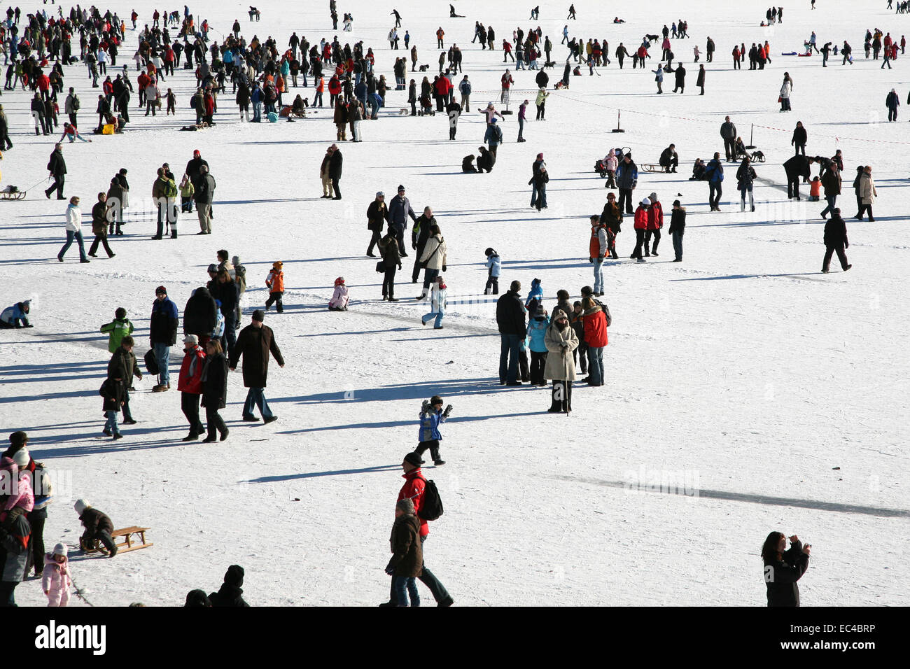 People on the frozen lake Titisee in the Black Forest Stock Photo