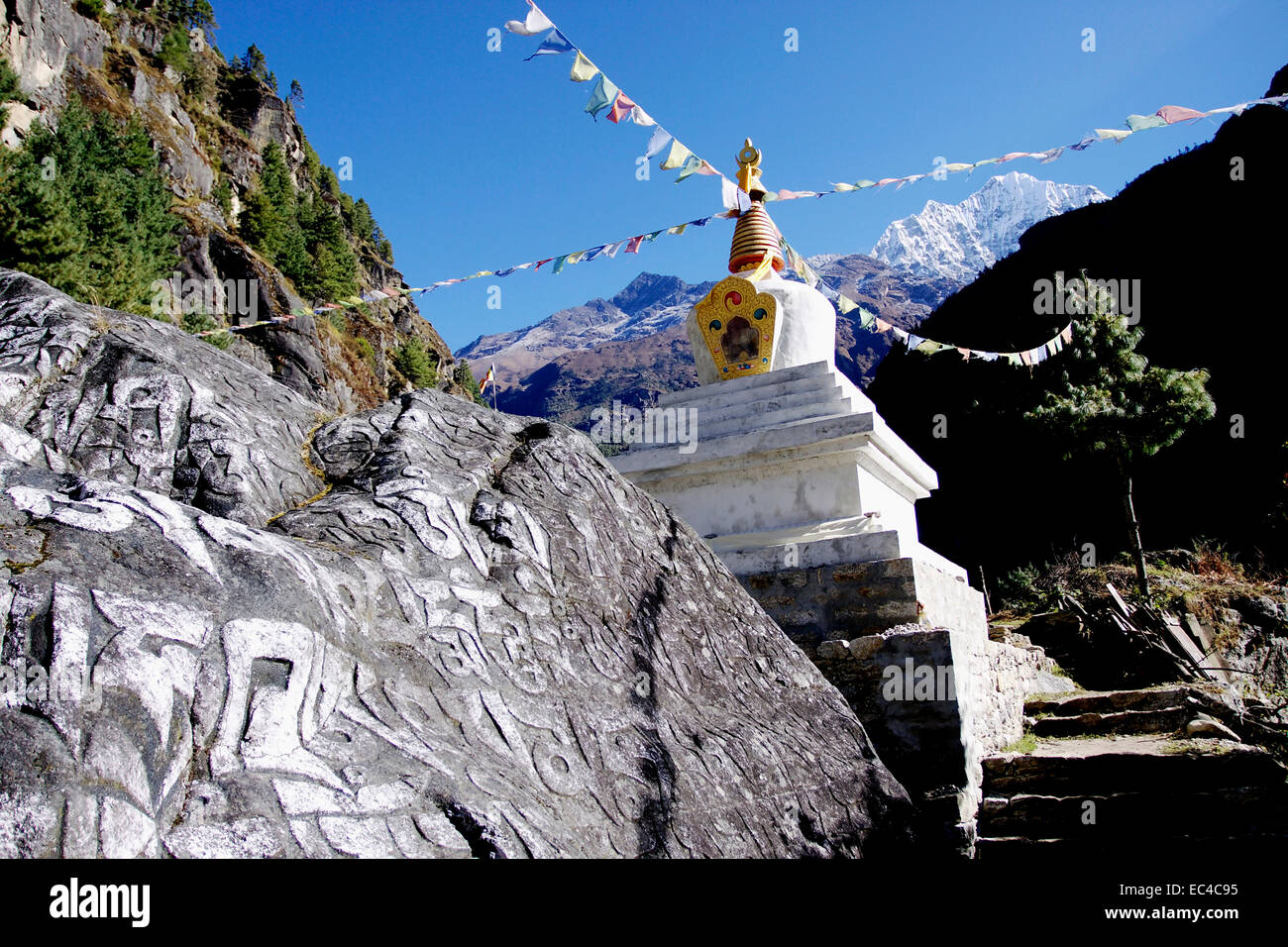 Stupa with prayer flags Stock Photo