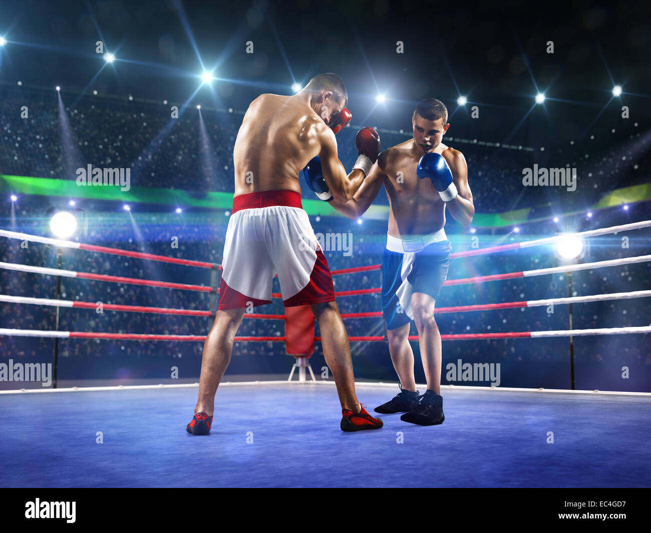 Two professionl boxers are fighting on arena Stock Photo - Alamy