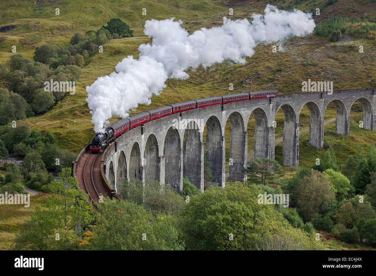 The Jacobite steam train on the Glenfinnan Viaduct, West Highland Line in Scotland. Stock Photo