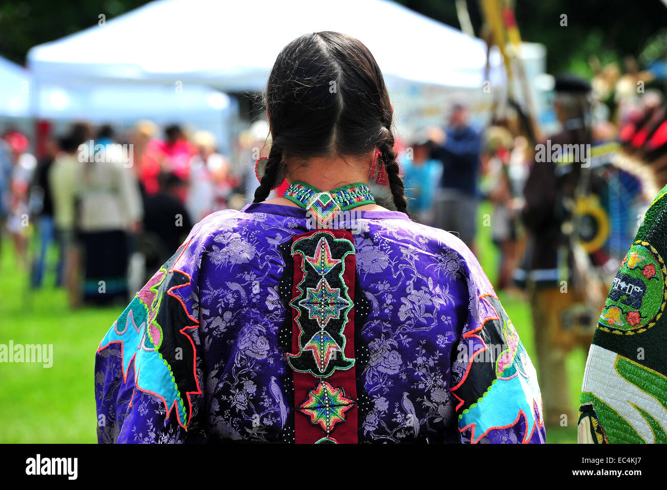 Indigenous Canadians women participate in Canada Day celebrations held in a park in London, Ontario. Stock Photo