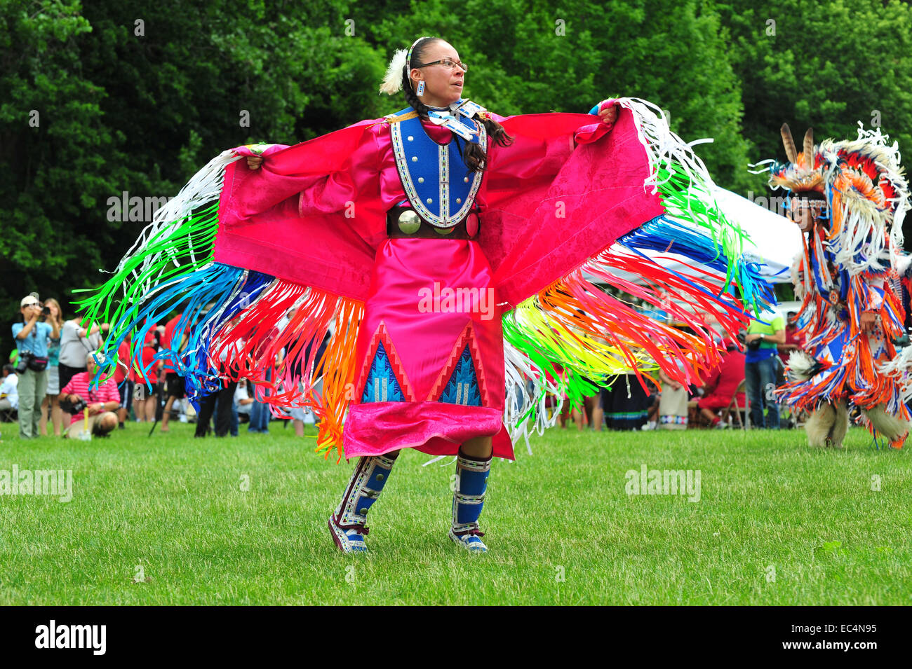 Indigenous Canadians dance during Canada Day celebrations held in a park in London, Ontario. Stock Photo