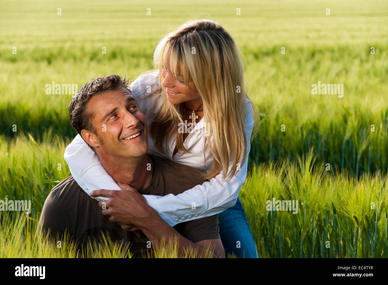 couple in love in a corn field Stock Photo - Alamy