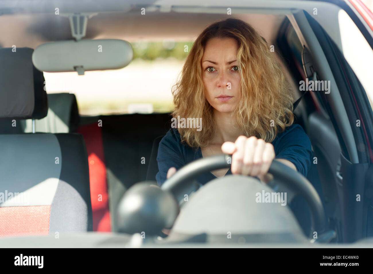 Women behind wheel hi-res stock photography and images - Alamy