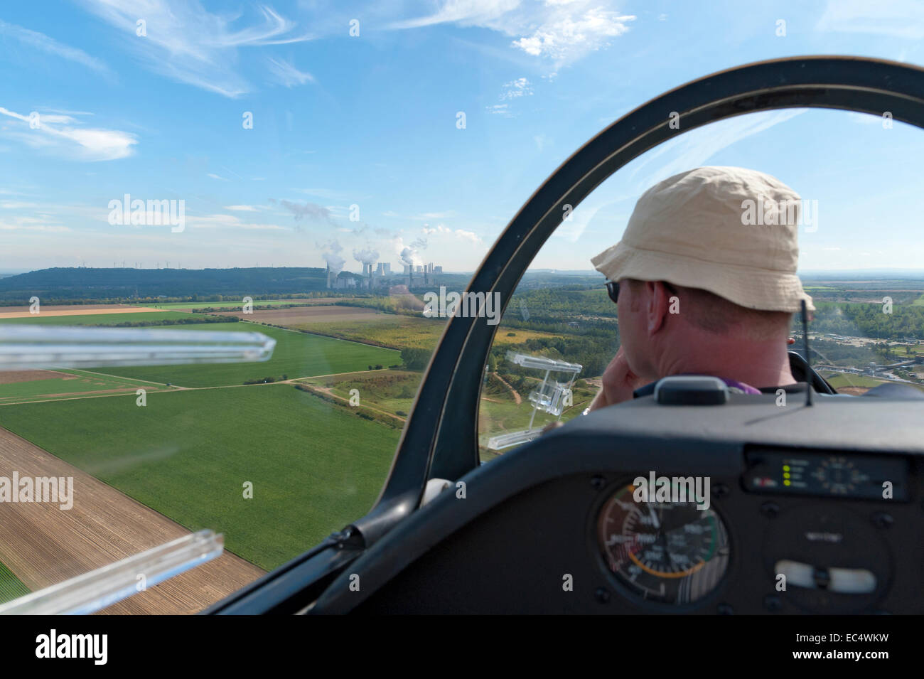 Pilot looks out of a glider Stock Photo Alamy