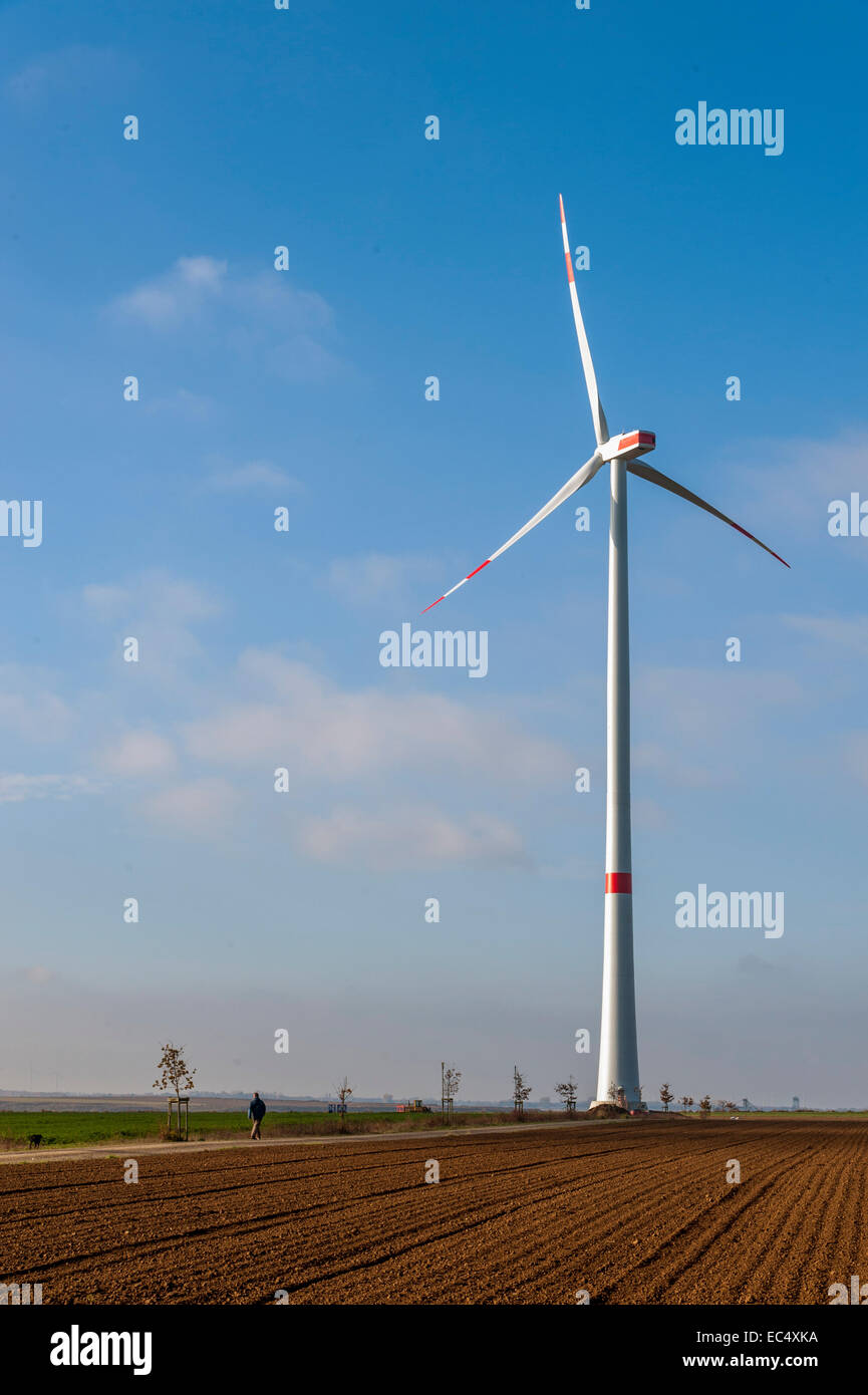 free-standing wind generator on a field in the sunshine Stock Photo