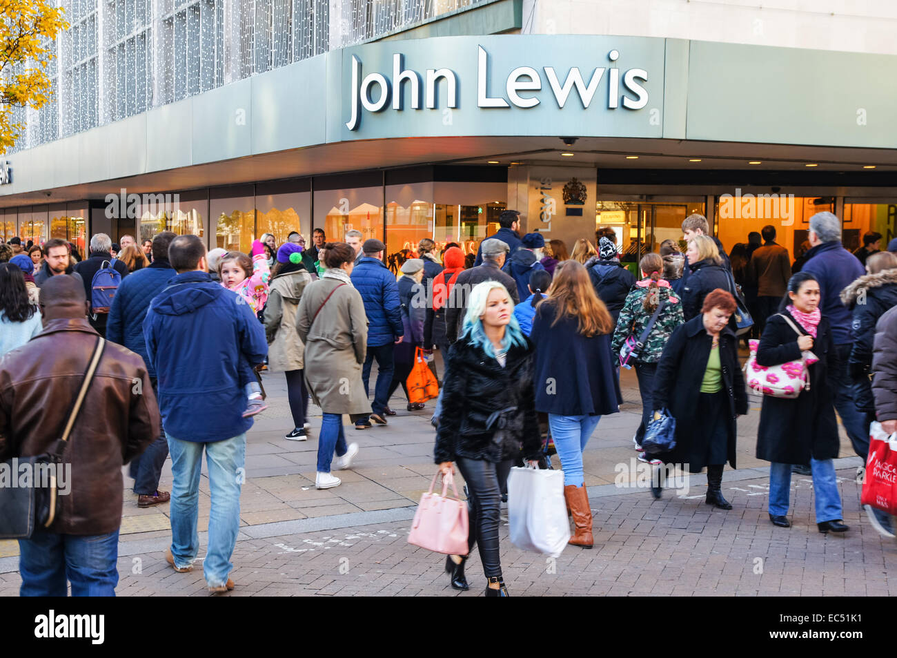 Shoppers outside John Lewis store on Oxford Street, London England
