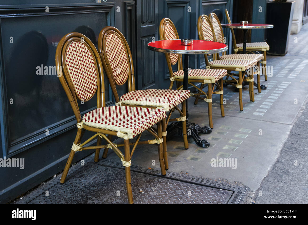 Tables and chairs outside restaurant in Fitzrovia, London England United Kingdom UK Stock Photo
