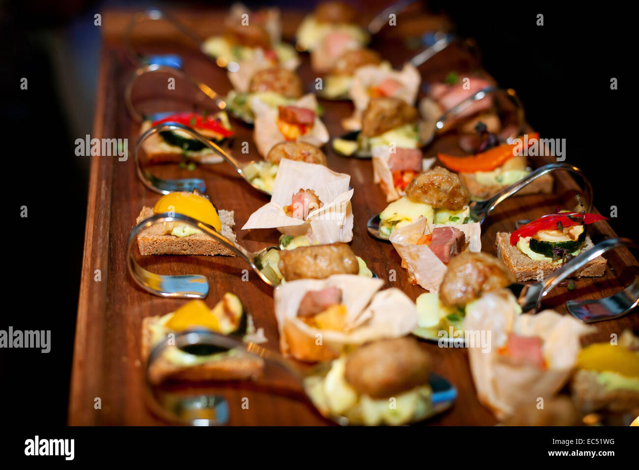 Amuse Gueule, Appetizers Served On A Wooden Plate Stock Photo