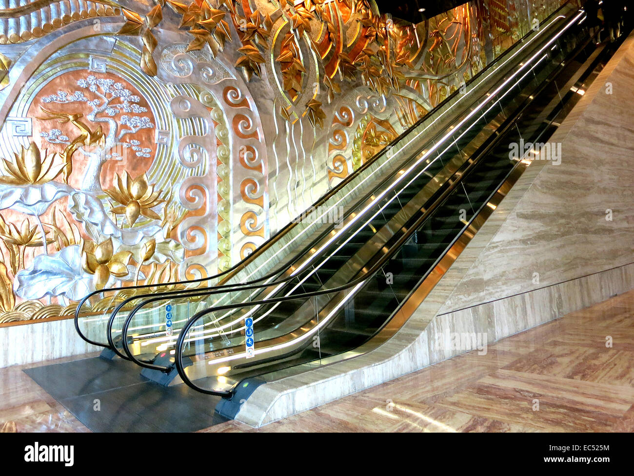 escalator in hall of The Ritz Carlton palace hotel Pudong Shanghai China Stock Photo