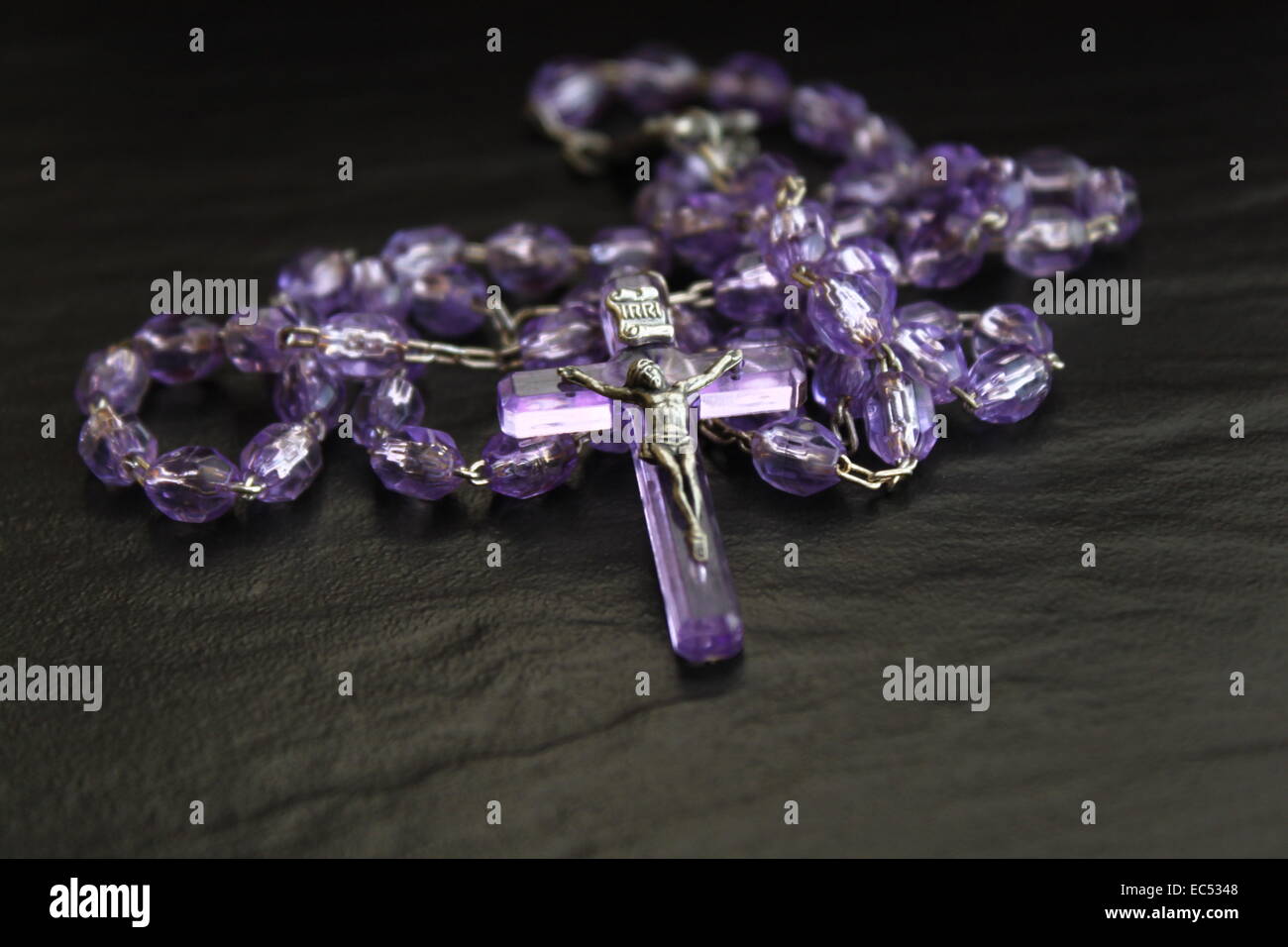 rosary on a black background Stock Photo - Alamy