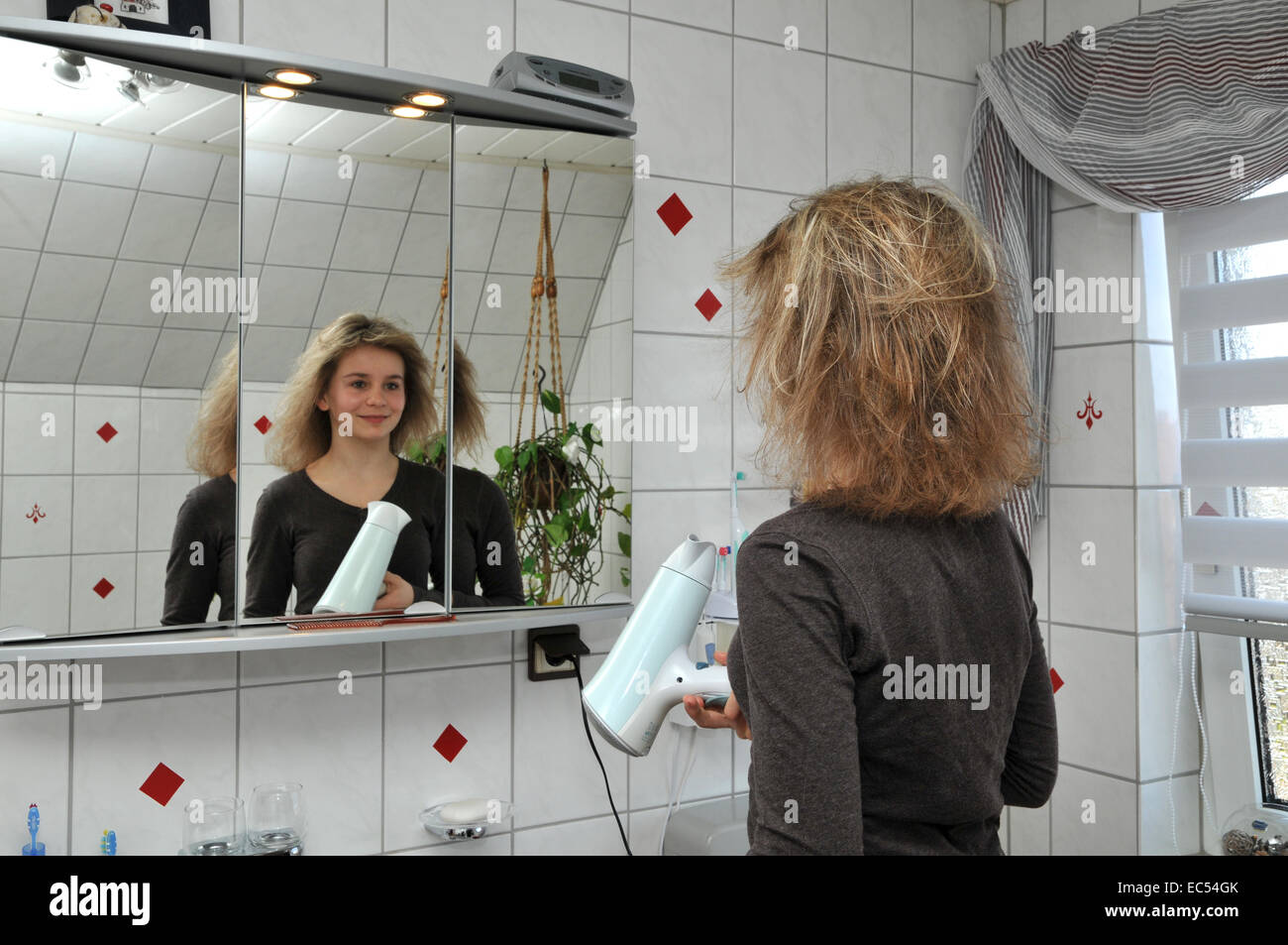 Hair style blonde blow dry hi-res stock photography and images - Alamy