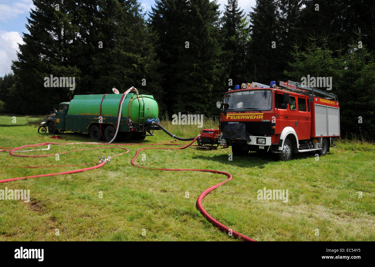 Firefighters and tankers Stock Photo