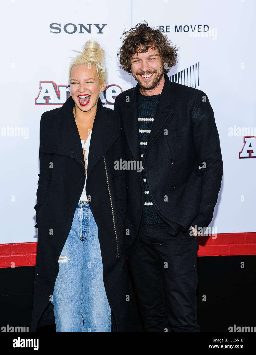 New York, USA. 7th December, 2014.  Sia Furler and Husband Erik Lang arrive at the New York City Premiere of 'Annie' at The Ziegfeld Theater in New York City Credit:  Patrick Morisson/Alamy Live News Stock Photo
