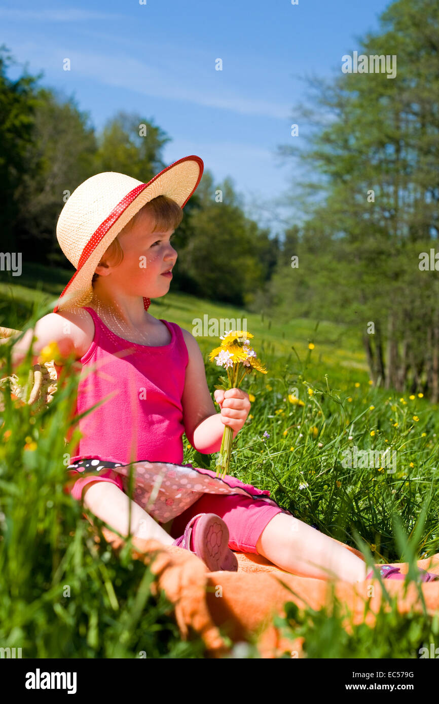a 4 years old girl in front of summer landscape Stock Photo - Alamy