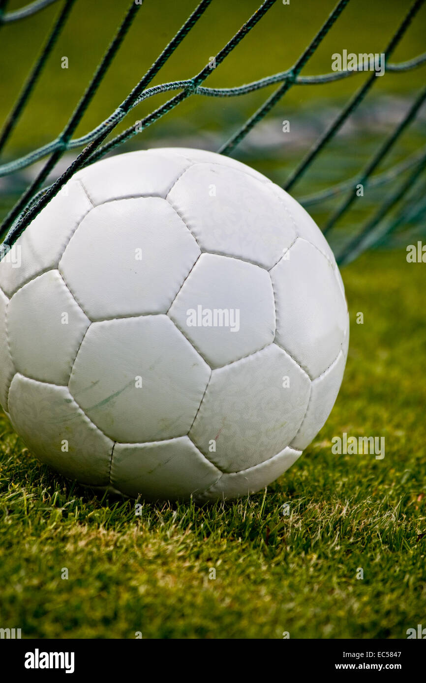 a soccer ball in the goal Stock Photo - Alamy